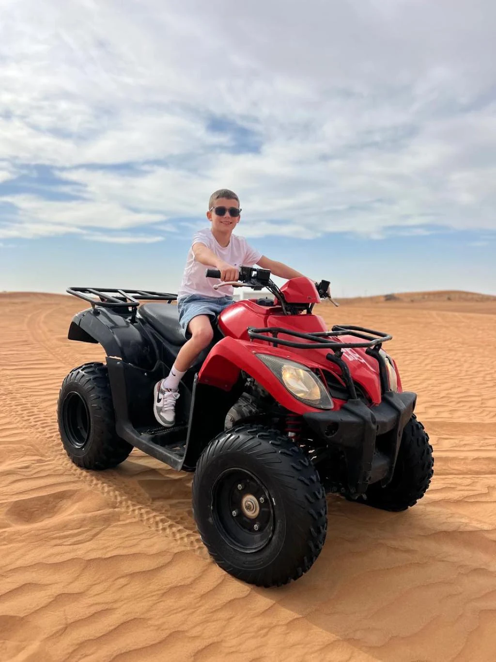 Quad bike ride across the desert dunes